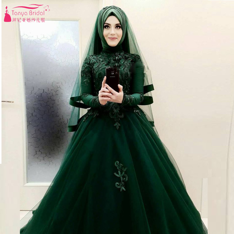 dark green dress with hijab